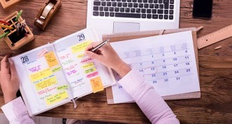 woman-filling-out-schedule-for-work-at-home-2